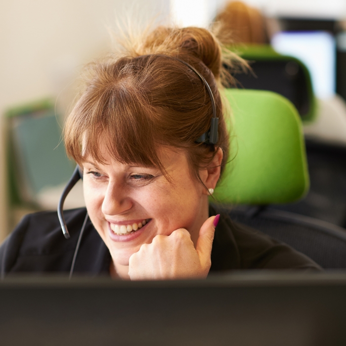 Crisis Supporter sitting on a green chair