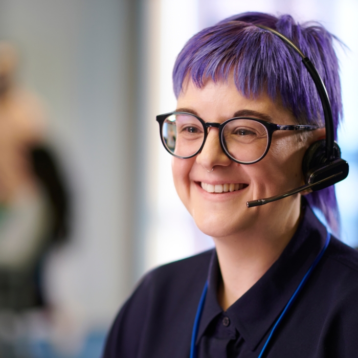 Crisis Supporter with purple hair