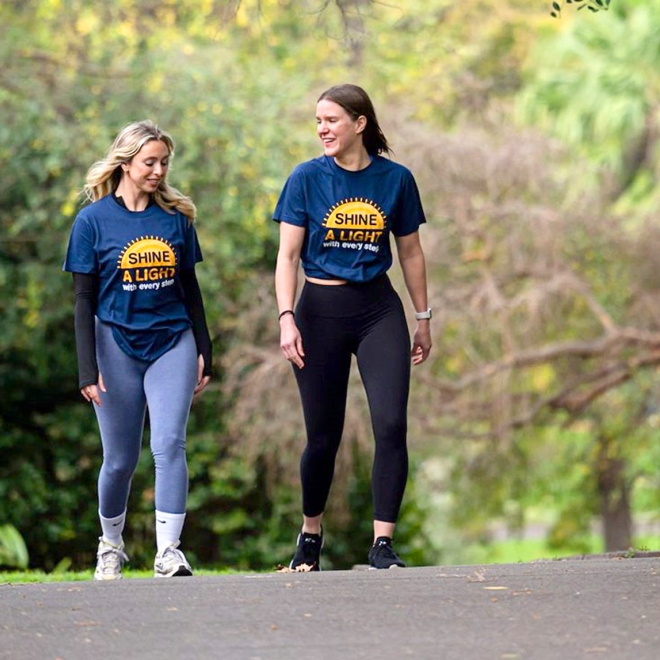 Lifeline volunteer - team walking through bush
