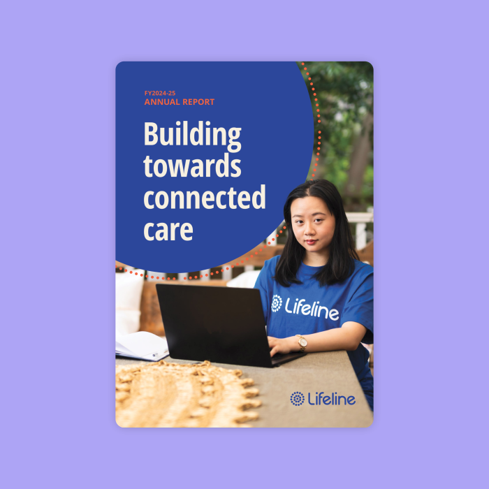 Cover of the Lifeline FY2024-25 Annual Report titled 'Building towards connected care', featuring a team member wearing a blue Lifeline shirt working on a laptop.
